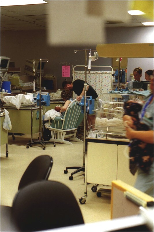 11-Neal-MummyAndDaddyWithSeanInNICU.jpg