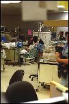 11-Neal-MummyAndDaddyWithSeanInNICU.jpg