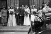 1954CliveandLindaBernardandMargaretsweddingpartywithcar.jpg